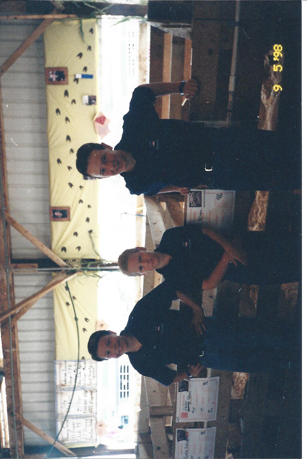 The three Folkman boys at an agricultural display, September 1998